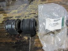 The one on the left is one of the old bushings I removed