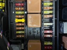 Luggage compartment fuse box showing the space for the relay.