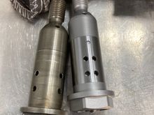 You can see the location of the 4 holes has changed. 