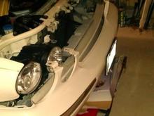 Headlamp removal without removing bumper cover.