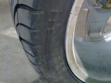 2009 6 3 (6) Bad Riken front tires which I spotted when doing my brakes.  Inside sidewall cracking.  Who installs walmart tires on this car?