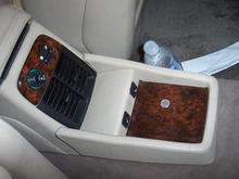 Rear seat console with heated seat pushbuttons.