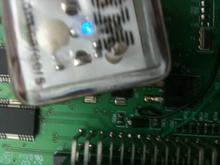 Although it looked burnt. I was able to establish continuity, notice the blue light.