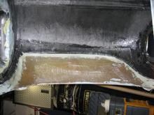14
We also had to reinforce the fenders from the underside with fiberglass tape.  What a pleasure it is to lay up fiberglass and resin upside down.  We only got the drivers side front fender done during this very long 4 day weekend (12 to 14 hours per day)