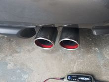 I go on the local Porsche Club rallies and one of the fun award categories of the car show afterwards is 'best exhaust tips'. So I thought I'd dress mine up a little with some red paint.