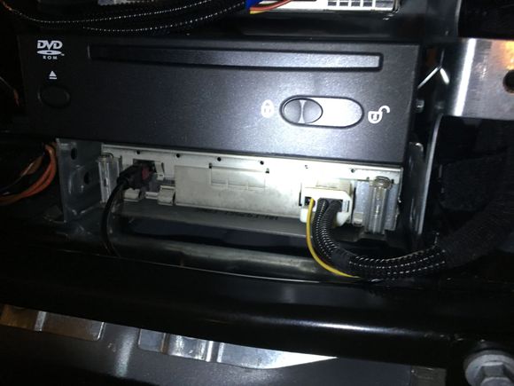 6. Here is the stack with the DVD for the Navigation system and, on the bottom, the IBOC tuner.