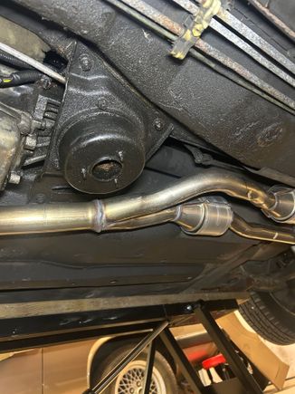 From under the left side