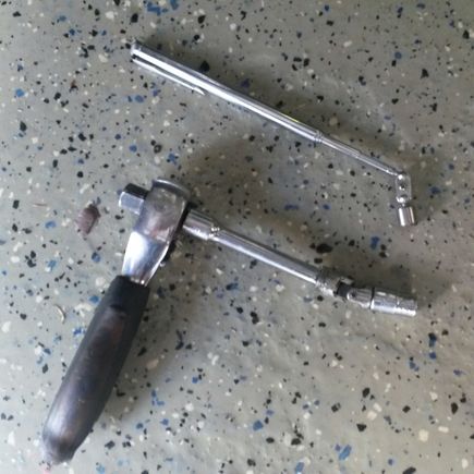 7mm socket 1/4" universal, small 1/4" extension and a small magnet