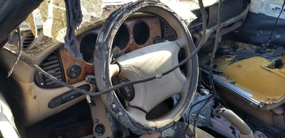 I believe that the steering wheel you have now looks better than this one.