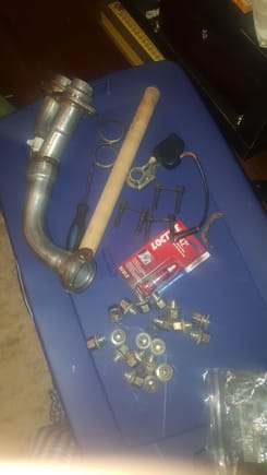 Proud owner of a LH downpipe... Need the bung for the 02 sensor. Oh,,, and a fairly rare boot lock actuator (via Paul's Jag), 20 undistorted xjs and xk8 lug nuts, rear teans axle bolts for the Porsche 928 (rebuilding the rear RH suspension) and an antique public bathroom towel bar that I came across... Q: am I losing my mind, lol???