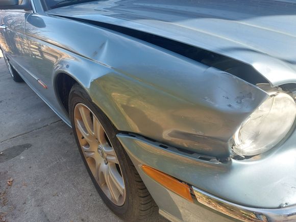 What I started with, a dented fender and a broken headlight.