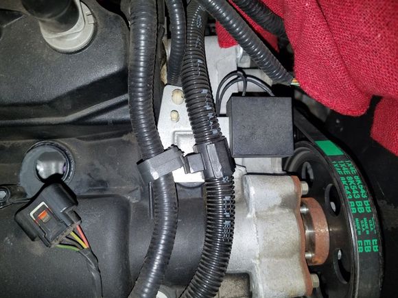 LH cam cover.  Cylinder #6 spark plug hole.
