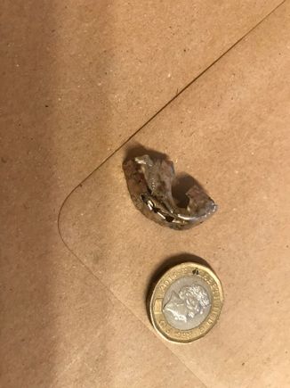 That’s a £1 coin for scale (23m diameter)
