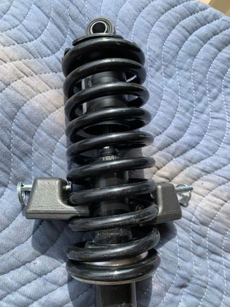 Spring is assembled on to the shock, but now it’s impossible to remove the clamps! 
