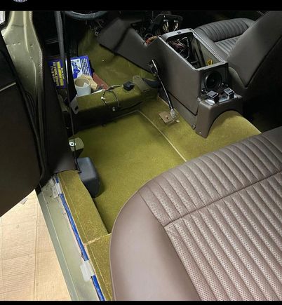 Original carpet with new seat covers. 