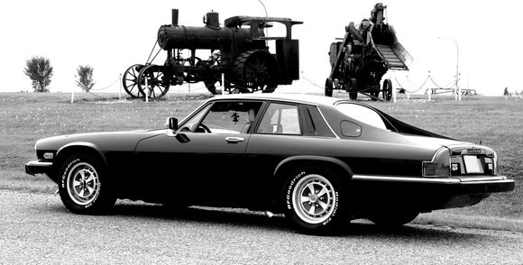 New paint, and no pin stipes, and door ding guards are GONE!