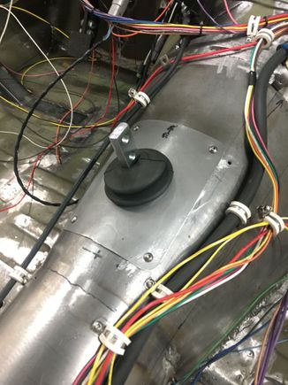 Shifter will sit slightly left and reward in the factory console hole.