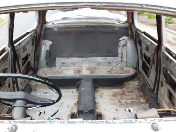 Internal photo showing where the pressing on the bottom forms the seat front which is the area covered by the black material.