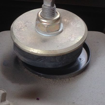 Bushing has separated from metal plate. Very soft as dough
