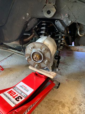 The hub only needs to go up a fraction of an inch to take the weight off the pin