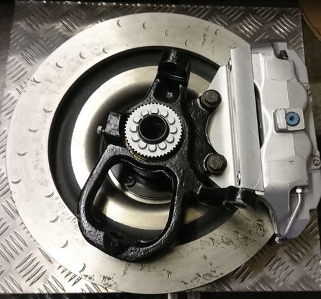 The brake setup from the back showing my mounting bracket on the 308 upright