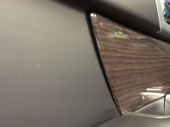 Rear driver wood trim sticking out