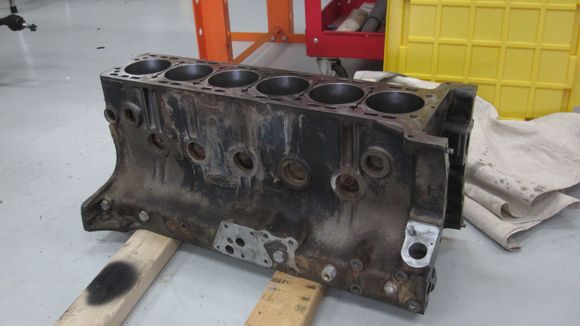 The block back from the machine shop. Not so healthy looking. The water jackets had quite a bit of rust.