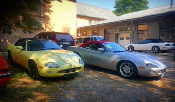 On the base; Primrose Yellow 2002 XKR waiting for upgrade.