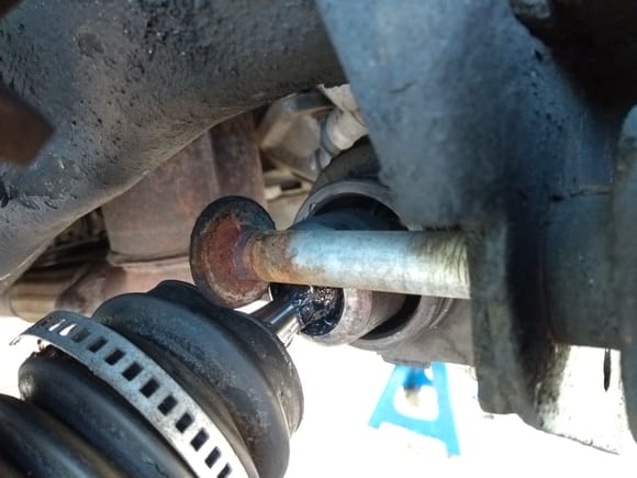 To get the eccentric bolt out, just loosen the tie rod boots and turn the steering to full lock. Wiggle them out