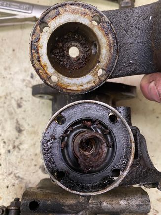 The front carb had these chunks in it and the spring on the diaphragm was rusted in half. Shocked that the car would run. 