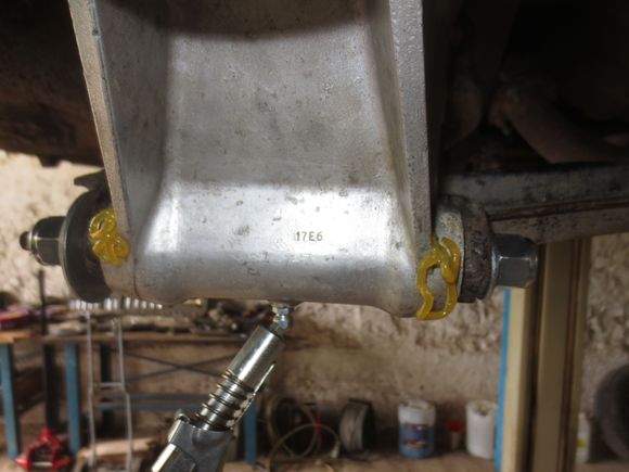 Grease coming out of the holes proving that the bearings are surrounded in grease, and more important, will have new grease pushed through them when regular servicing ss done.