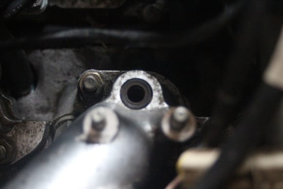 Showing the Old Injector Seal in the Manifold, take it out and fit New Ones.