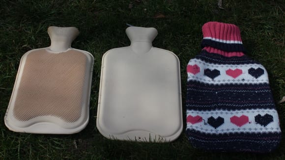 The Ideal Gasket Material was cut out of the Smooth Sides of the GF's Hot Water Bottle