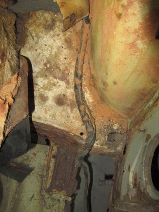 bundle on left side now passes along inside of sill in depression to front of car