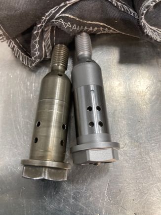 You can see the location of the 4 holes has changed. 