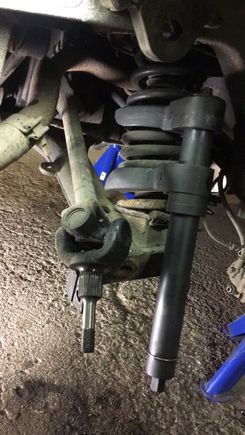 A decent handcranked spring compressor, found on ebay. Not especially expensive.