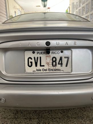 The back-up camera is sitting below the tired growler and above the license plate. I routed the wire through a small hole already present between the plinth and the sheet-metal. 