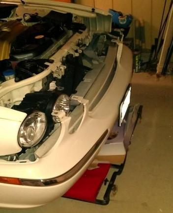 Headlamp removal without removing bumper cover.