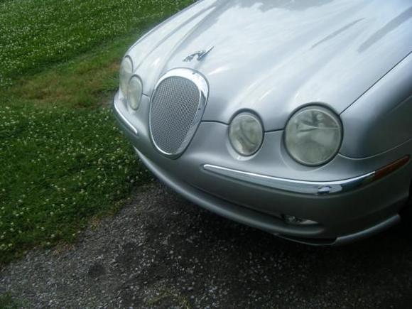 showin the chrome mesh grille. top and bottom