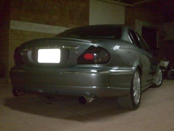 smoked tail lights
Trunk R badge
Lip spoiler
Quad mafflers
Lowerd springs