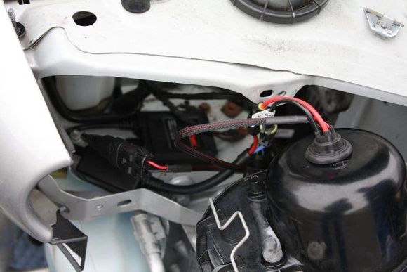 The arrangement of the ballast boxes behind the headlight.  The ballasts sit below the headlight assembly.  Lots of room to mount something this size there.