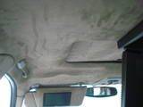 Suede headliner with some monitors showing, 15" monitor in middle