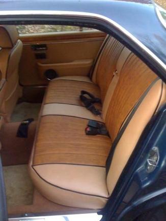 I went with the 'burl wood grain pleather" ... added 3/4" med density foam