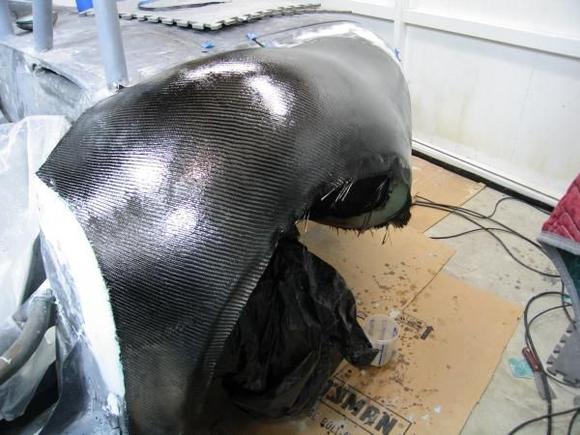 Just like the front, we finally were able to laminate the carbon skin over each of the rear quarterpanels.  It felt good to be making progress but, honestly, the car still looked pretty rough.