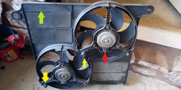 Each fan has a connector (Red arrow).  The yellow arrows point to the harness clips - there is a ziptie at each clip that will need to be cut.  The green arrow points to the sign of quality and craftsmanship.