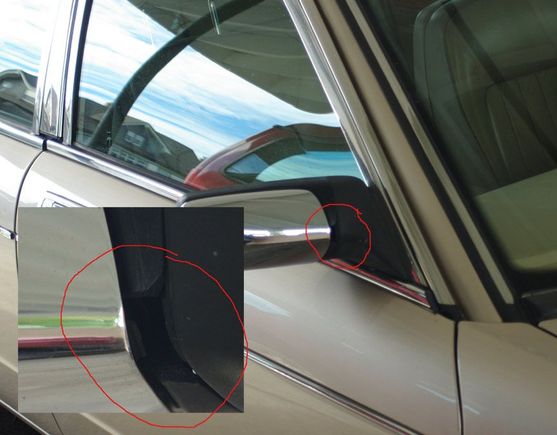 Cowl of passenger mirror broken at chrome cover clip