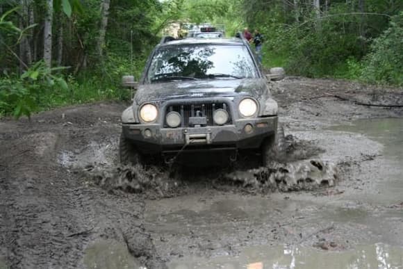 Splashing through the mud last July on the way back from May Lake.  More wheeling with the CLAW!!