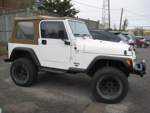 1990 TJ with 3inch rubicon express liftkit and 33&quot; tires.