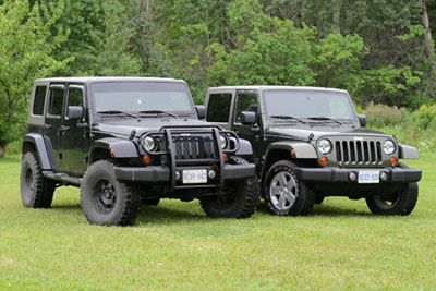 Trevor's stock Sahara 2dr compared to my lifted Sahara 4dr.