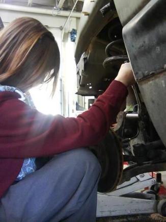 workin on a van at school.